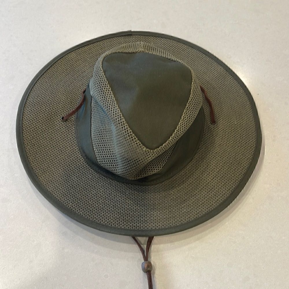 Henschel hat co. Hat size large, leather adjustable strap, great sun protection.